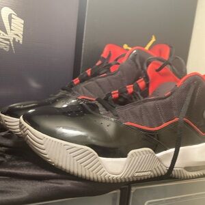 Jordan 11s red and black